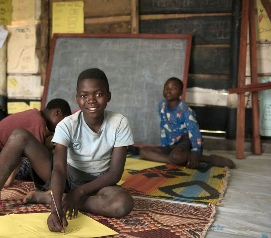 Munguiko*, 14, takes part in activities at the Premiumaid Foundation space in Rwamwanja refugee settlement.